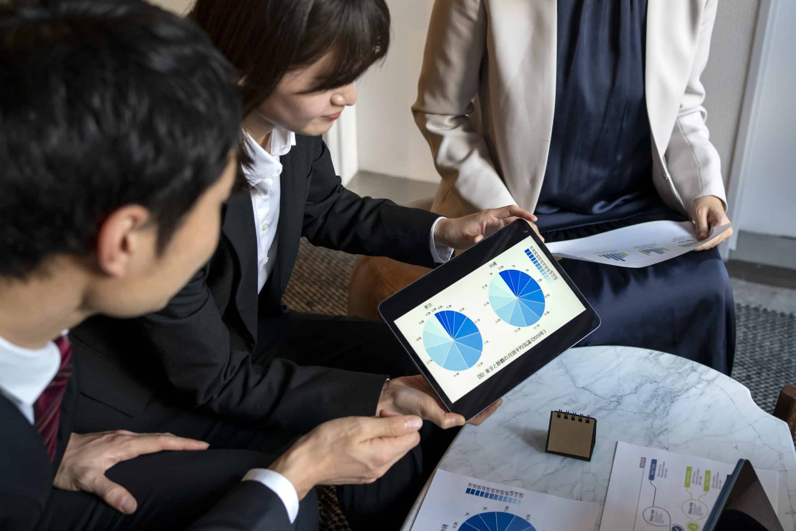 business-people-working-with-ipad-side-view-scaled.jpg business-people-working-with-ipad-side-view-scaled.jpg