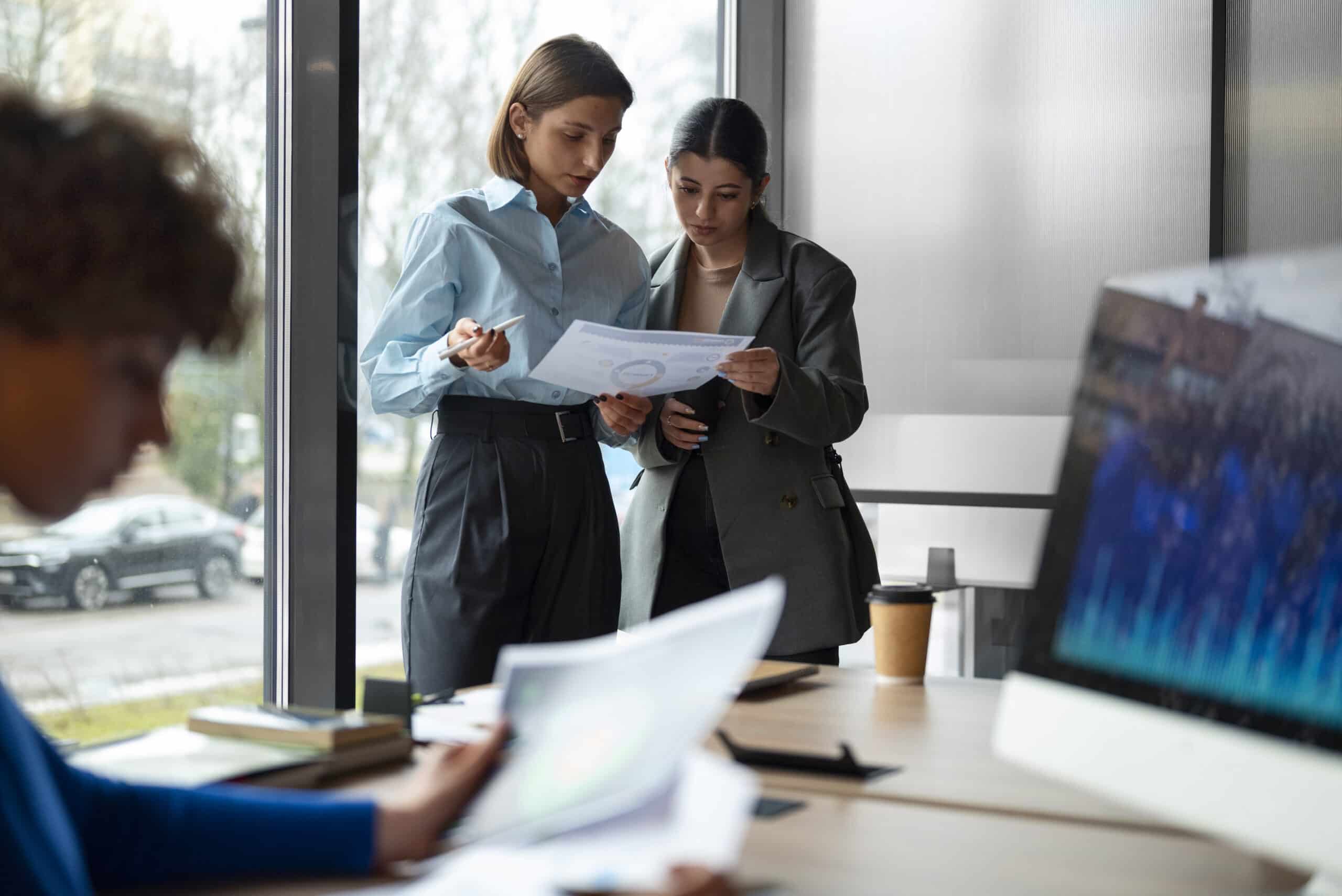 people-office-analyzing-checking-finance-graphs-scaled.jpg